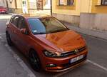 Diesen VW Polo Mk6 in der Farbe  Electric Orange  habe ich in Oktober, 2022 aufgenommen.