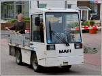 Elektromobil der Marke Mafi im Einsatz als Transportfahrzeug mit Baumaterial, aufgenommen auf Wangerooge am 07.05.2012.