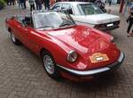 Alfa Romeo Spider 2.0 im Farbton rosso alfa aus dem Jahr 1987.