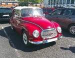 Zaungast beim Ford-Treffen an Mo´s Bikertreff in Krefeld am 26.04.2026. Ein DKW Auto Union 1000 S Coupe, gebaut von 1959 bis 1963. Das gezeigte 1000S Coupe stammt aus dem Jahr 1960 und dürfte im Farbton karneolrot lackiert sein. . Bei den M ...