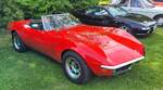 Chevrolet Corvette C3 Stingray Roadster im Farbton monza red aus dem Jahr 1969.