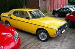 Profilansicht eines Datsun 120A Cherry F II Coupe.