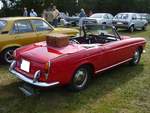 Profilansicht eines Fiat 1200 Cabriolet aus dem Modelljahr 1961. Oldtimertreffen des Oldtimerclubs Schermbeck am 22.09.2019 in Lühlerheim.