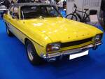 Ford Capri 1 im Farbton daytonagelb, gebaut von 1969 bis 1973. Der Capri 1 wurde von den deutschen und englischen Ford-Werken gemeinsam entwickelt und im Januar 1969 vorgestellt. Das Modell bewirkte einen extremen Anstieg der Verkaufszahlen bei Ford. Der Capri war mit einer breit gefächerten Motorenauswahl bestellbar. Der abgelichtete Capri ist ein 1700 XLR in der sportlichen GT-Ausstattung. Er ist mit dem 1699 cm³ großen V4-Motor mit einer Leistung von 75 PS ausgestattet. Ein solcher 1700 GT kostete im Jahr 1970 ab DM 8.900,00. Techno Classica Essen am 05.04.2024.