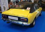 Heckansicht eines Ford Capri 1 im Farbton daytonagelb aus dem Jahr 1971. Techno Classica Essen am 06.04.2024.