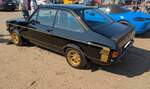 Profilansicht eines Ford Escort MK2 1600 Sport aus dem Jahr 1980 im Farbton black. Oldtimertreffen anl�sslich des 100´ten Jahrestages der Rekordfahrt von BABS am 27.04.2026 am Strand von Pendine Sands/West Wales.