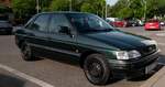 Hier ist ein Ford Escort Mk5 Liftback in dunkelgr�n zu sehen.