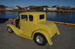 Ford  Tin Lizzie  Ford Modell A (1928–1931), Gelber US Oldtimer PKW, gesehen auf den Lofoten in Svolvear am Hafen am 02.07.2014.