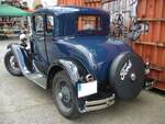 Heckansicht eines Ford Model A Coupe aus dem Jahr 1928 im Farbton bright blue. Zaungast beim 50. Jahrestreffen der Borgward I.G. e.V. an der  Alten Dreherei  in Mülheim an der Ruhr.