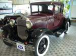 Ford Model A Coupe. 1928 - 1931. Die Coupeversion des Model A war in den  Ausstattungsvarianten Standard und DeLuxe lieferbar. Der 4-Zylinderreihenmotor leiste 40 PS aus 3.3l Hubraum. Alt-Ford-Treffen in Essen am 12.05.2013.