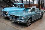 Ford Mustang Fastback Coupe aus dem Jahr 1966. Der im Farbton aqua blue lackierte Mustang wurde im Februar 2017 in der Düsseldorfer Classic Remise abgelichtet.