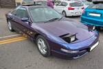 Ein Ford Probe der zweiten Generation, wie er von 1993 bis 1997 gebaut wurde. Schon der 1988 vorgestellte 'Pobe' der ersten Generation war eine Gemeinschaftsentwicklung von Ford und Mazda. Der hier gezeigte, rechts gelenkte 'Probe' im Farbton royal b ...