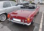 Heckansicht eines MG B im Farbton damask red aus dem Modelljahr 1974.