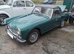 MG Midget MKII im Farbton brooklands green. Der Midget, zu deutsch = Zwerg, wurde bereits 1961 vorgestellt. Die Baureihe wurde 1965 durch den gezeigten Midget MKII abgelöst. Der gezeigte Wagen wurde 1967 erstmalig zum britischen Straßenverk ...