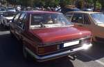 Heckansicht eines sienaroten Opel Rekord E1 in der Karosserieversion viert�rigle Limousine und der luxuri�sen  Berlina-Ausstattung . Oldtimertreffen am  Cafe del Sol  in Gelsenkirchen am 09.08.2026.
