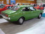 Toyota Corona Mark II. 1971 - 1976. Mit dem Modell Corona begann 1960 die Exportoffensive von Toyota. 1963 erreichten die ersten Modelle in Dänemark europäischen Boden. Das Modell Mark II war technisch gleich, als der  normale  Corona aufgebaut. Er war allerdings 12 cm länger und optisch mehr an den amerikanischen Autogeschmack angepasst. Angetrieben wird der Wagen von einem wassergekühlten 4-Zylinderreihenmotor, der aus 1858 cm³ Hubraum 87 PS leistet. Die Höchstgeschwindigkeit liegt bei 160 km/h. Toyota Collection Köln am 02.12.2017.