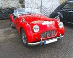 Triumph TR3 im Farbton signalred, gebaut von 1955 bis 1957.