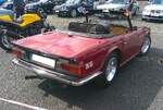 Heckansicht eines Triumph TR6 im Farbton carmine red aus dem Jahr 1972. 10. BCMM ( B ritish C ar M otorcycle M eeting) am 19.07.2026 an Mo´s Bikertreff in Krefeld.
