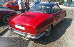Heckansicht eines VW Typ 14 Karmann-Ghia Coupe aus dem Jahr 1964.