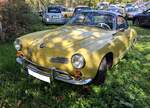 VW Typ 14 Karmann-Ghia Coupe des Modelljahres 1964. Das gezeigte Coupe d�rfte in der Farbkombination manilagelb/schwarz lackiert sein. Im Jahr 1964 konnte der Karmann-Ghia K�ufer zwischen zwei luftgek�hlten Vierzylinderboxermotoren w�hlen: 1192 cm� m ...
