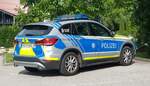 =BMW X1 der bayrischen Landespolizei steht im Juli 2022 zur Dienstverrichtung in Piding