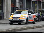 Polizei Genf unterwegs in einem Skoda in Genf am 16.04.2023