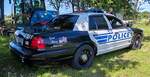 =Ford Polizeifahrzeug von der Spokane Valley Police, gesehen beim US-CAR-TREFFEN in Bardowick, 06-2024