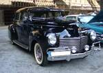 Chrysler Series 25-Six Windsor des Modelljahres 1940. Von diesem Modell und seinem Schwestermodell Royal verkaufte die Chrysler Corporation im Jahr 1940 73.998 Fahrzeuge. Im Verkaufsprospekt bietet Chrysler eine Vielzahl von Zierbeschlägen als E ...