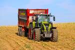 LU Schmidt Ronneburg mit Claas 870 mit Strautmann H�ckselwagen am 23.08.23 bei der Maisernte 2026 zwischen Langenselbold und Ronneburg 
