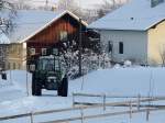 FENDT Farmer 308 LSA, tuckert durch die winterliche Landschaft; 130119