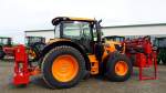 John Deere Traktor 6210R in der Farbe Orange zusehn auf der Kotschenreuther Hausmesse in Zeulenroda-Triebes am 08.03.16