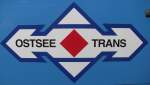 Logo des Verkehrsunternehmens des Ostsee-Bezirkes Rostock,  OSTSEE TRANS , Broderstorf [27.10.2012]