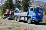 Ein MAN Hängerzug von Rubin&Morger der am 14.5.24 die Schneeschleuder der BLM von der Winteregg ins Tal transportiert.