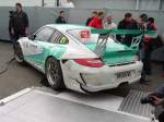 Ein Porsche 911 des Porsche Carrera Cup der auf den Hockenheimring verladen wird am 17.10.10