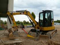 Caterpillar 305E CR am 29.09.2013 auf einer Baustelle in Trier-Föhren
