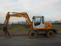 Liebherr A 311 Litronic im Industriepark Trier-Föhren am 06.03.2011