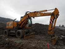 Liebherr A 312 Litronic am 10.02.2013 auf einer Baustelle an der B419 zwischen Nittel und Rehlingen