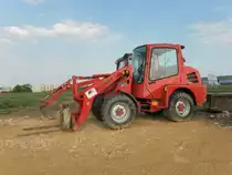 Schaeff SCL 515 in einem Gewerbegebiet bei Kehlem (Lux.) am 25.04.2011