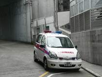 Ein Polizeiauto nahe dem Victoria Peak in Hongkong. Da Hongkong quasi wie ein eigenes Land ist, unterscheiden sich Polizeifahrzeuge und -uniformen von denen in China. 09/2007