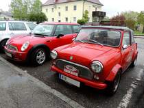 MINI-Oldy und Mini-New jeweils in roter Farbe trotzen dem Regenwetter; 140501