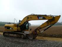 Caterpillar 323D L auf einer Straßenbaustelle zwischen Eßlingen und Scharfbillig (25.08.2013)