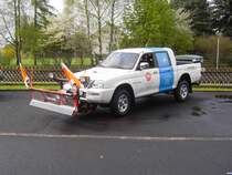Mitsubishi L 200 der Fuldaer Reinigungsfirma  Universal - Reinigung  mit Rumschild fr den Winterdienst