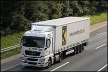 Ein MAN TGX 18.440 der Spedition FIEGE ist mit einem Kombifracht Auflieger in Richtung Norden unterwegs. (25.09.2008)
