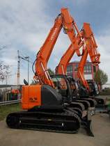 Hitachi Zaxis ZX 135 US-5B aufgenommen bei der Hausausstellung eines Baumaschinenhändlers in Schweich am 03.04.2014
