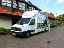 VW Crafter der Firma HAGEMEYER steht auf dem Rathausplatz in 36100 Petersberg, Mai 2015