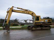 Caterpillar 235C auf dem Kirchberg bei Luxembourg (26.11.2006)