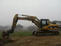 Caterpillar 319C LN am 13.04.2009 bei Junglinster (Lux.)