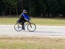 KTM Life-Speed, eBike mit Bion-X Antrieb auf einem fallendem Güterweg; 150321