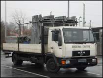 MAN mit Pritschenaufbau in Bergen am 04.12.2013