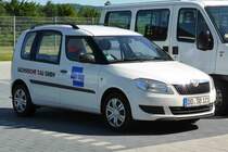 Skoda Roomster von  Sächsische Bau GMBH , abgestellt auf einem Parkplatz in Biebergemünd im Juli 2015